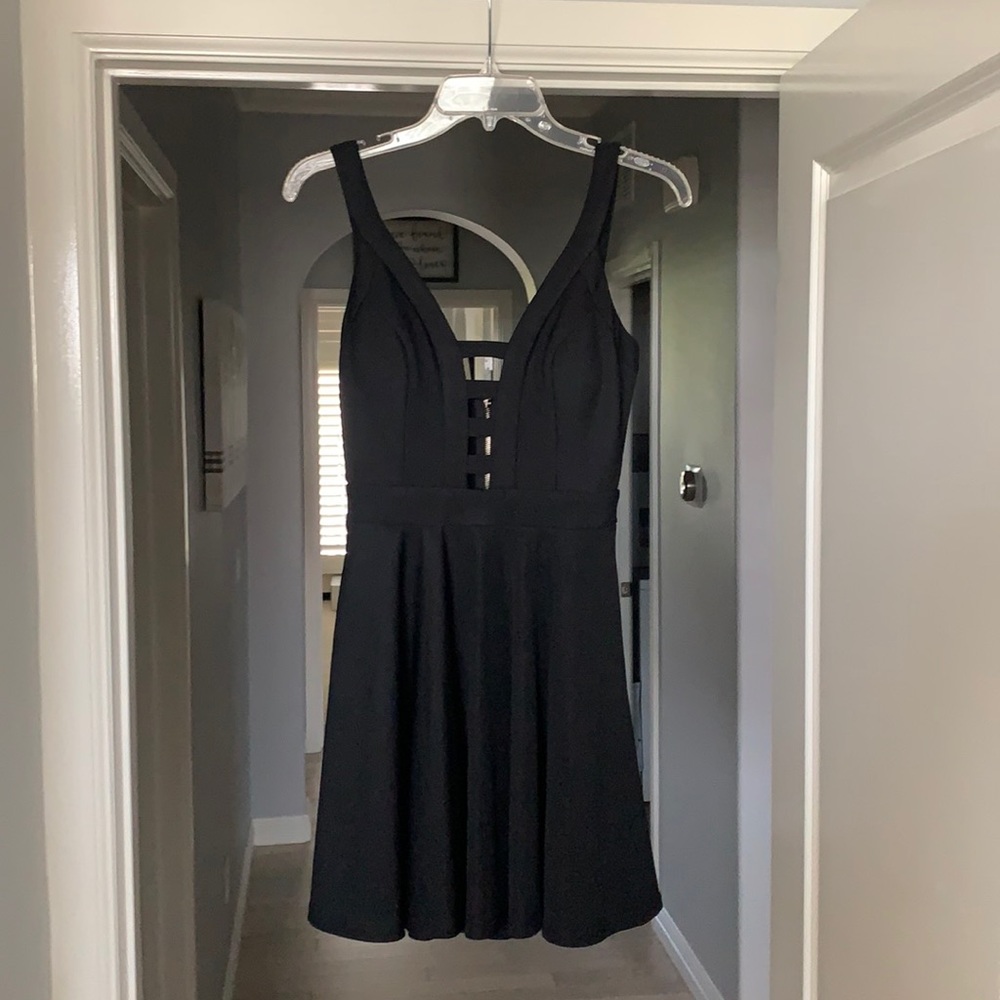 Selling a skater- styles black dress!